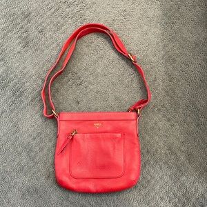 Red leather Fossil crossbody with gold hardware